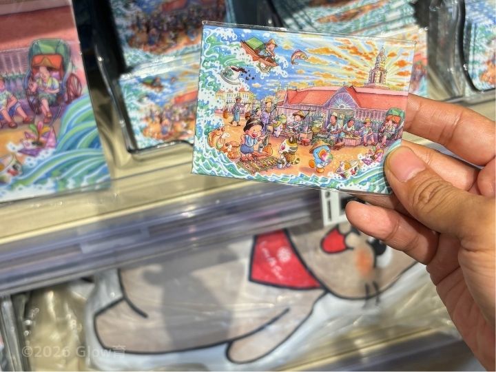 アーグオのイラストが描かれたラオパサのマグネットやポストカード